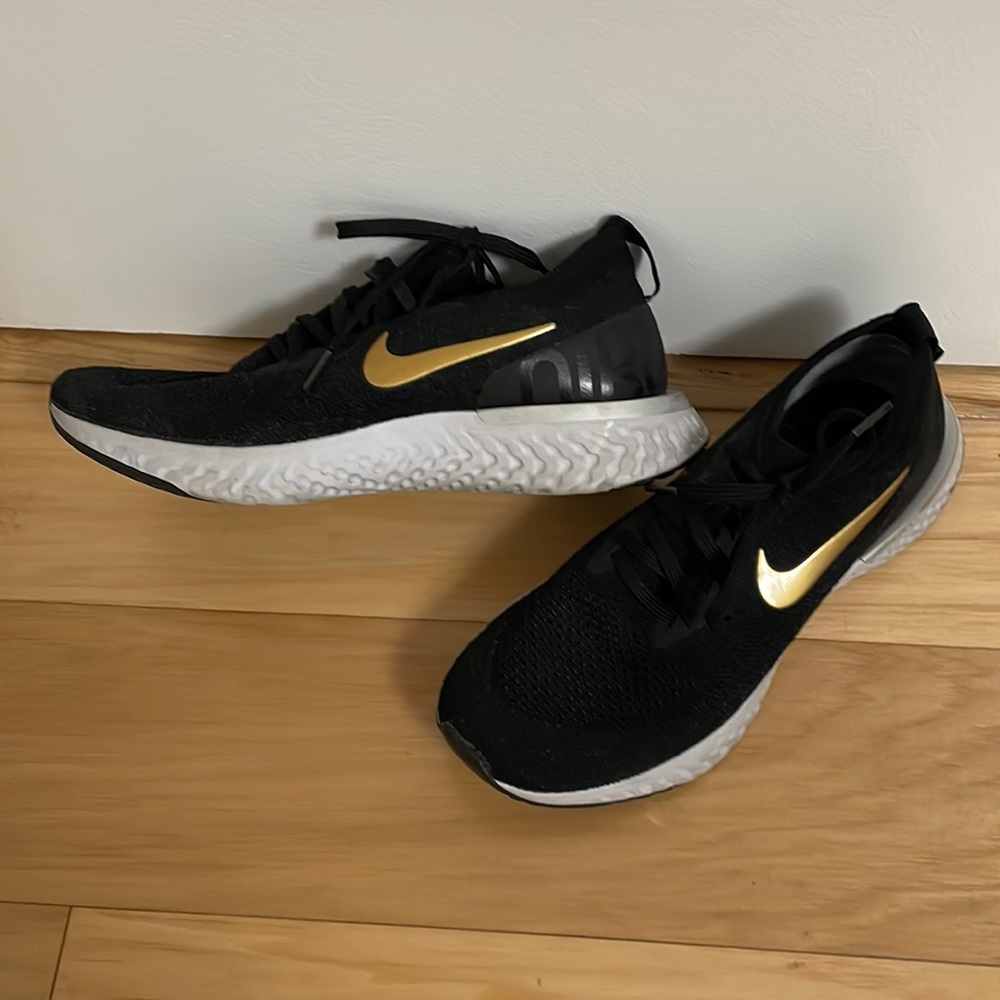 Nike Epic React black and gold sneaker